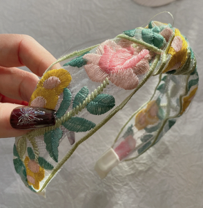 Floral embroidered mesh headband with pink and green leaves